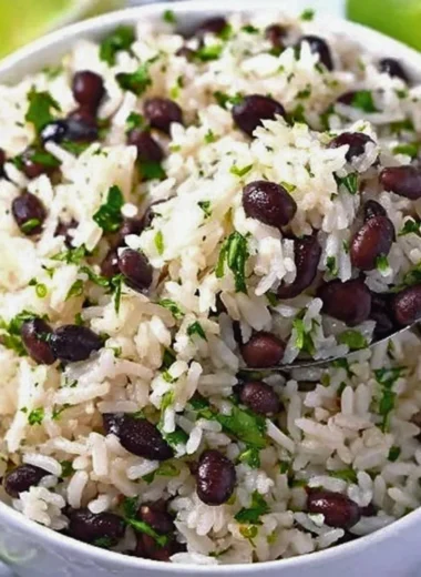Cilantro lime rice served with black beans for a flavorful meal.