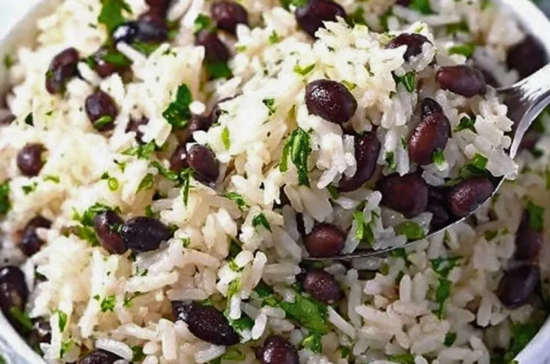 Cilantro lime rice served with black beans for a flavorful meal.