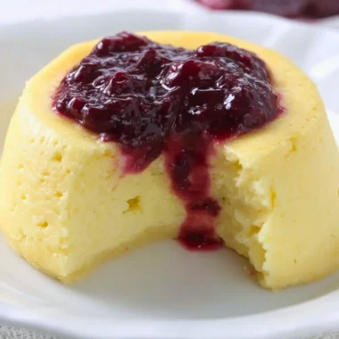 Delicious Keto Microwave Cheesecake topped with berries