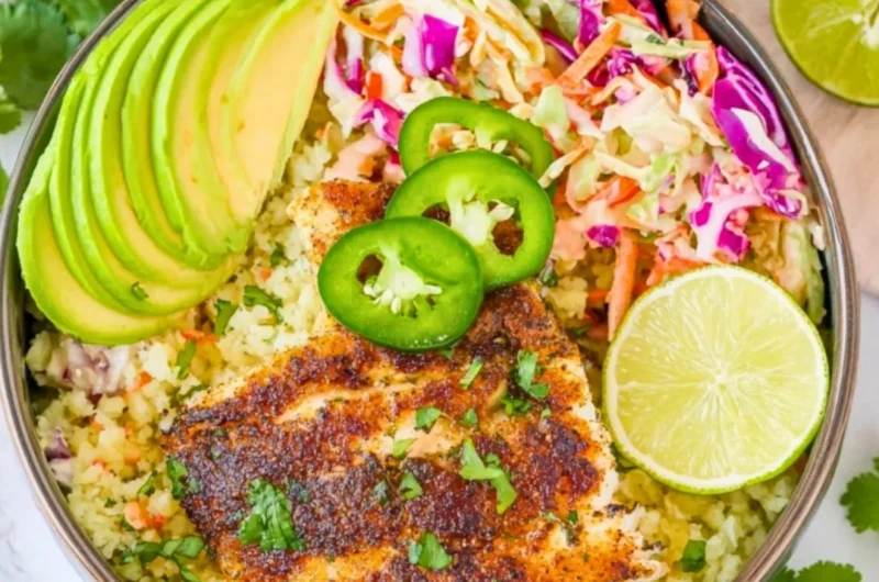 Healthy low carb fish taco bowls with fresh ingredients and vibrant toppings