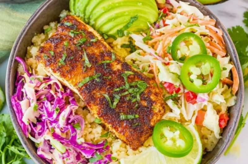 Low carb fish taco bowls with fresh ingredients and vibrant toppings