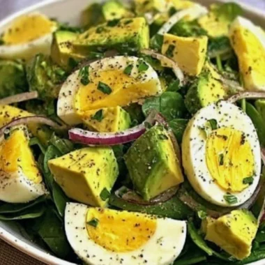 Power Salad featuring avocado, egg, and spinach in a fuel bowl