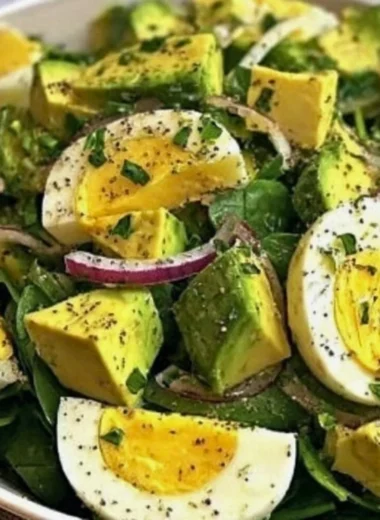 Power Salad featuring avocado, egg, and spinach in a fuel bowl