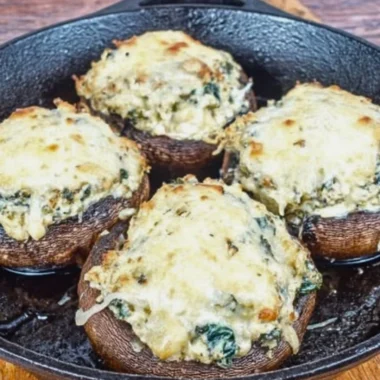 Ricotta stuffed Portobello mushrooms topped with herbs and spices.