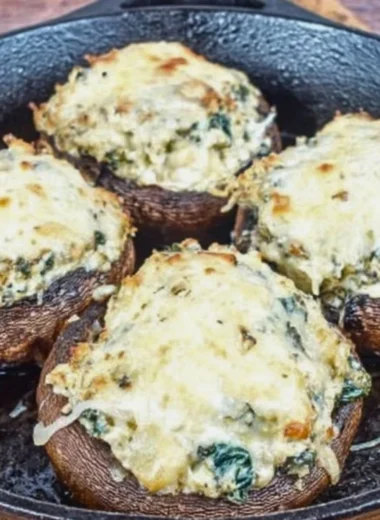 Ricotta stuffed Portobello mushrooms topped with herbs and spices.