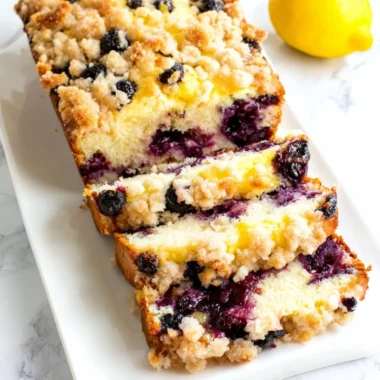 Delicious Blueberry Lemon Loaf with fresh blueberries and zesty lemon glaze.