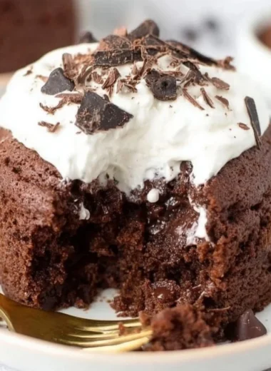 Delicious chocolate banana mug cake in a white mug