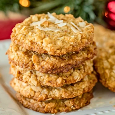 Delicious homemade Coconut Oatmeal Cookies on a wooden plate