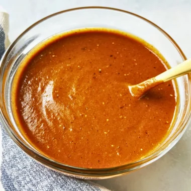 Bowl of easy homemade enchilada sauce with fresh ingredients