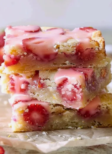 Freshly baked easy strawberry lemon blondies on a platter