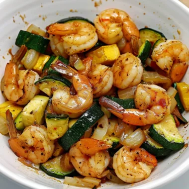 Hibachi shrimp rice bowl with vegetables and sauce