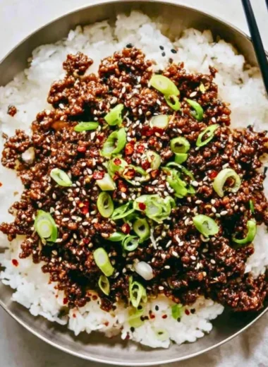 Easy Korean ground beef dish garnished with sesame seeds and green onions