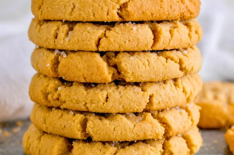 Freshly baked peanut butter cookies on a cooling rack