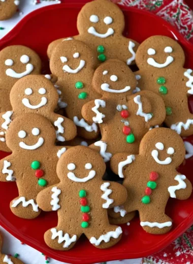 Soft and chewy gingerbread men cookies decorated for the holidays