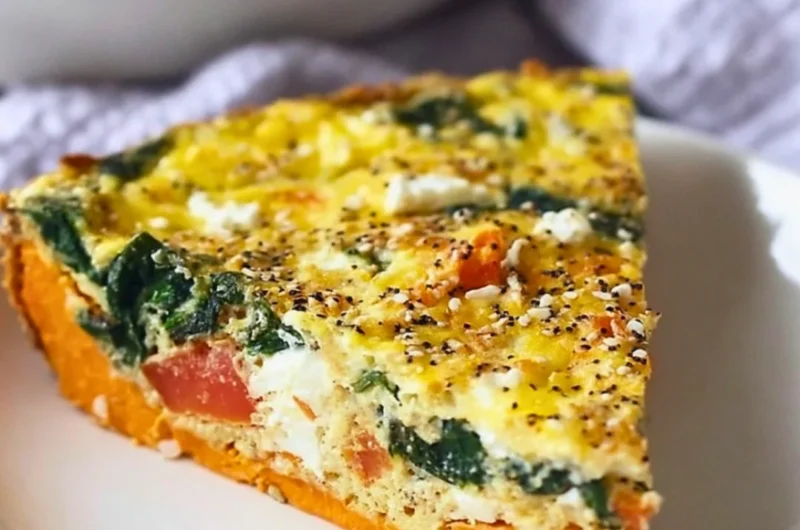 Spinach Goat Cheese Quiche with Sweet Potato Crust on a white plate