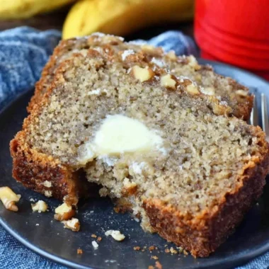 Delicious Starbucks copycat banana bread sliced and served on a wooden board