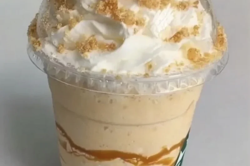 Starbucks Grande Caramel Ribbon Crunch Crème drink featured on TikTok by @foodies247
