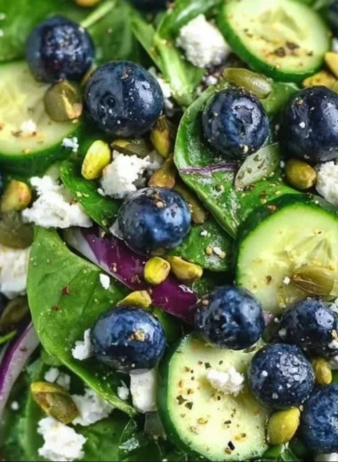 A vibrant Blueberry Pistachio Spring Salad featuring fresh blueberries and crunchy pistachios.