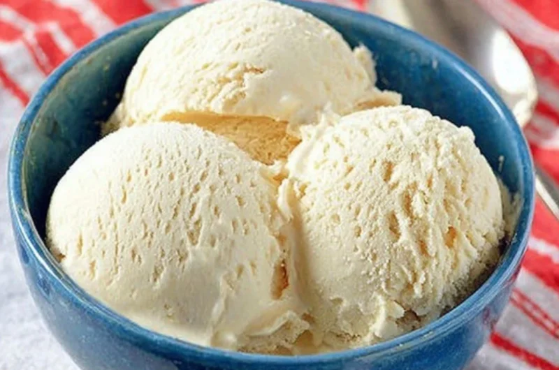 Delicious Cold Stone cake batter ice cream in a bowl with sprinkles.