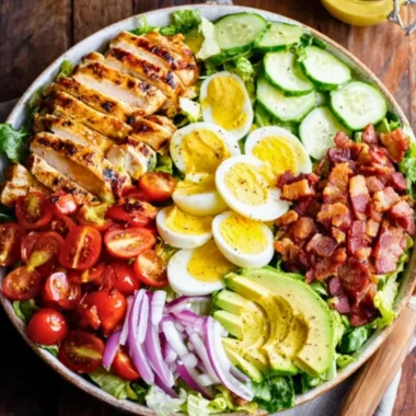 Grilled Chicken Cobb Salad with fresh vegetables and creamy dressing