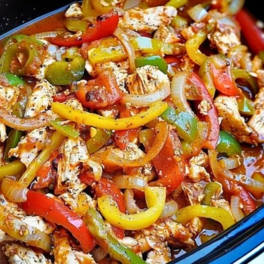 Slow cooker chicken fajitas with colorful vegetables and chicken strips