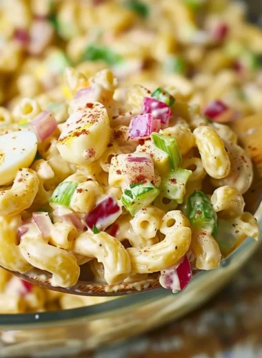 Bowl of Southern Macaroni Salad with colorful vegetables