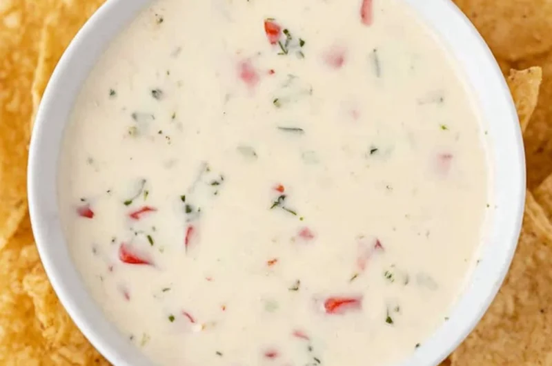 Creamy Mexican white cheese dip served with tortilla chips