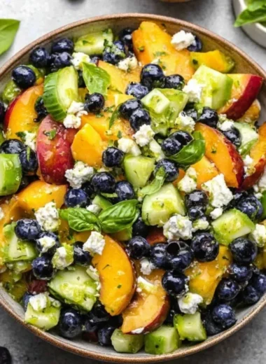 Delicious Blueberry Peach Feta Salad with fresh fruit and feta cheese