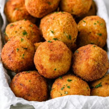 Delicious cheesy rice balls (Arancini) served as a crispy appetizer.