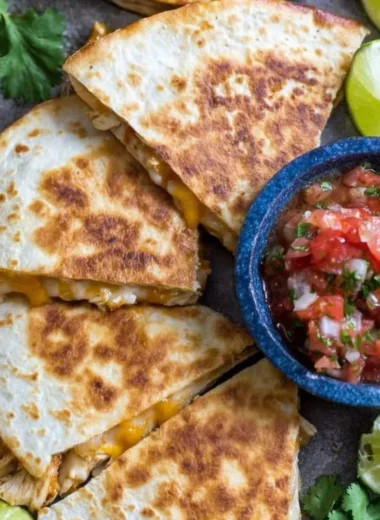 Delicious Chicken Quesadillas with melted cheese and fresh ingredients