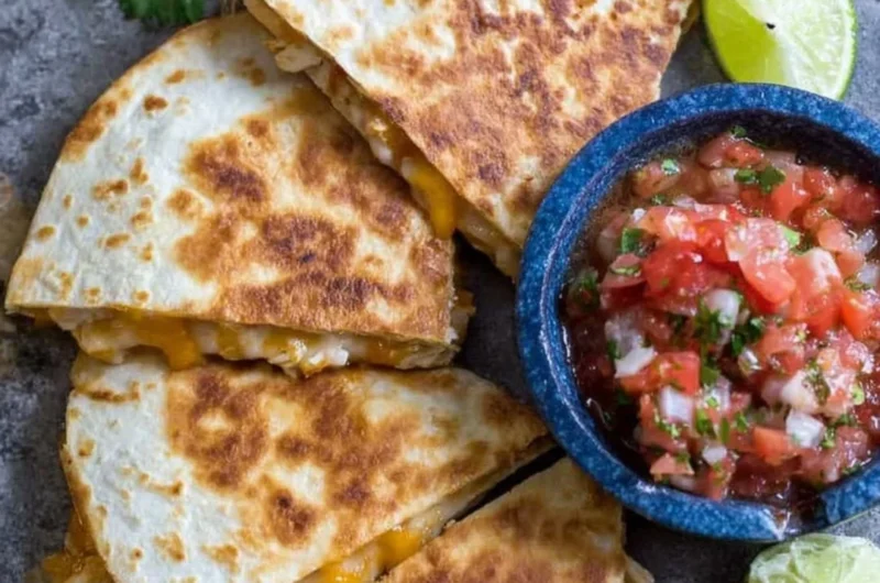 Delicious Chicken Quesadillas with melted cheese and fresh ingredients