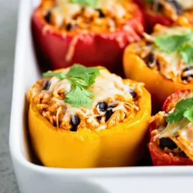 Baked Chicken Stuffed Peppers filled with seasoned chicken and vegetables