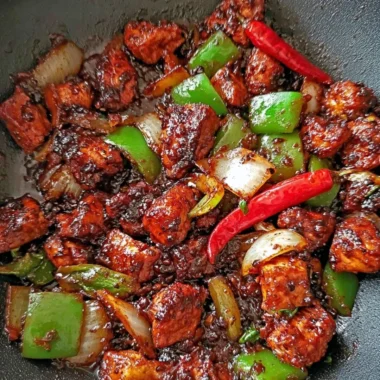 Easy Black Pepper Chicken recipe served on a plate with vegetables