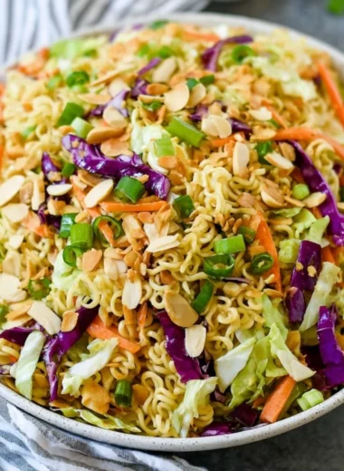 Hearty ramen noodle salad with fresh vegetables and dressing