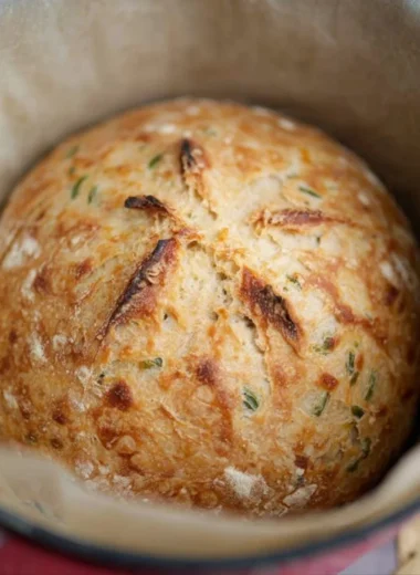 Sourdough Jalapeño Cheddar Artisan Bread loaf with melted cheese