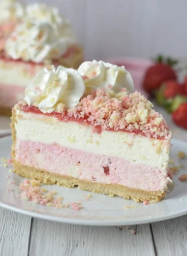 Delicious Strawberry Crunch Cheesecake with a creamy layer and crunchy topping