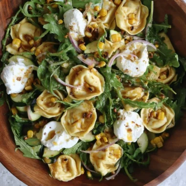 Delicious summer tortellini salad with fresh vegetables and dressing