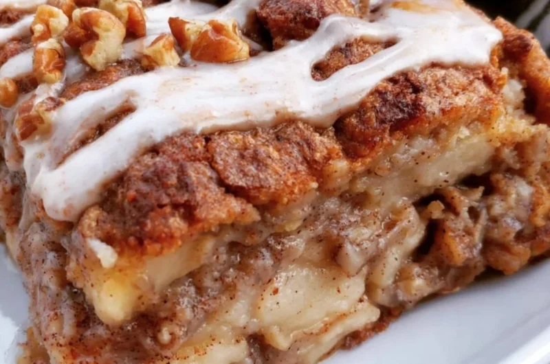Delicious apple oat cake served on a rustic wooden table in a cozy setting