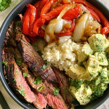 High protein steak fajita bowl with vibrant vegetables and spices