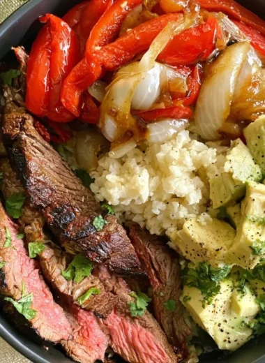 High protein steak fajita bowl with vibrant vegetables and spices